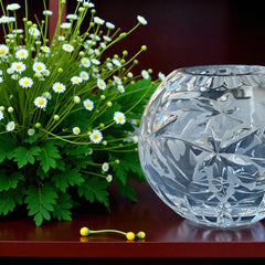 Vintage cut and etched crystal rose bowl with starburst and leaf motifs, clear glass, 5" diameter and 4.5" height, elegant midcentury design for floral display or decorative styling.