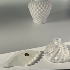 Vintage Bohemia Glass perfume bottle with frosted feather‑shaped stopper and clear twisted base, made in Czechoslovakia.