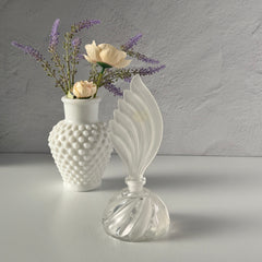 Vintage Bohemia Glass perfume bottle with frosted feather‑shaped stopper and clear twisted base, made in Czechoslovakia.