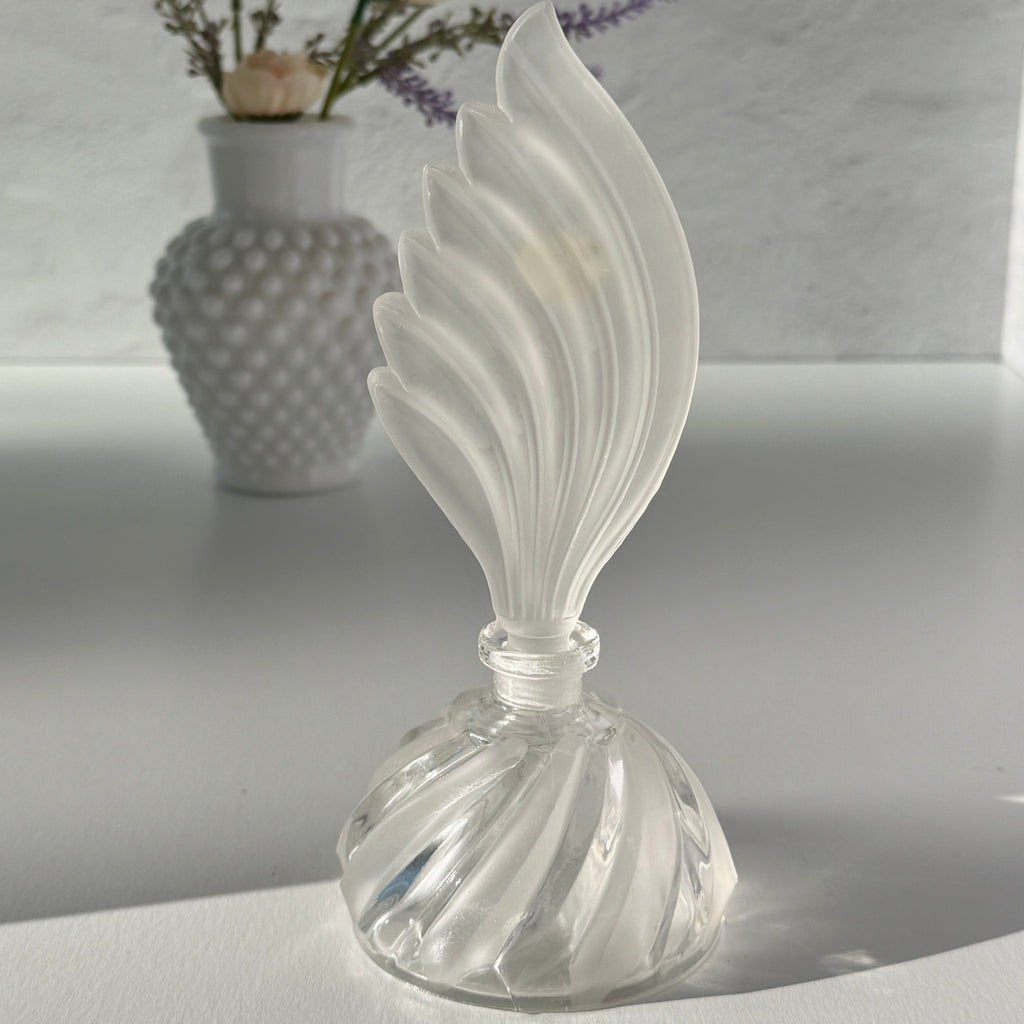 Vintage Bohemia Glass perfume bottle with frosted feather‑shaped stopper and clear twisted base, made in Czechoslovakia.