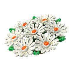 Vintage 1960s enamel daisy brooch with white petals, orange centers, and green leaves in a round floral cluster. Silver-toned finish, 2-inch diameter, in very good condition.