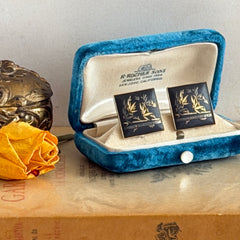 Vintage Amita Japan damascene square cufflinks with gold and silver bamboo motif on black enamel, signed on the back, displayed on a neutral surface.