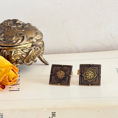 Vintage Spanish damascene square cufflinks with gold‑on‑black geometric floral star motif and silver‑tone granulation