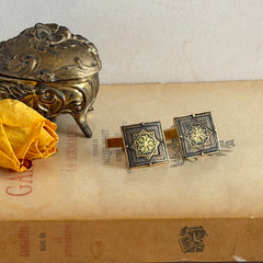 Vintage Spanish damascene square cufflinks with gold‑on‑black geometric floral star motif and silver‑tone granulation