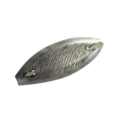 Vintage Danish S.I.D. pewter hair barrette with textured diagonal surface and signed back, elongated oval shape, 1970s–80s Scandinavian design.