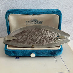 Vintage Danish S.I.D. pewter hair barrette with textured diagonal surface and signed back, elongated oval shape, 1970s–80s Scandinavian design.