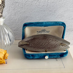 Vintage Danish S.I.D. pewter hair barrette with textured diagonal surface and signed back, elongated oval shape, 1970s–80s Scandinavian design.