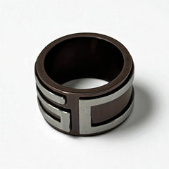 Dolce & Gabbana men's stainless steel ring with brown finish and raised silver-tone logo; bold designer accessory in size 8.5 with wide band styling.