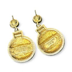 Vintage Eisenberg Ice Christmas ornament earrings with green enamel, clear rhinestone band, and gold-tone stud; signed and festive dangle design.