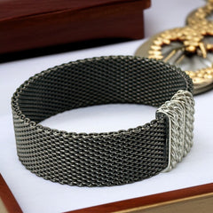 Signed Erica Zap bracelet in black nickel mesh with rhodium-plated magnetic clasp, 7-inch size, ¾-inch width, contemporary sculptural design, excellent condition.