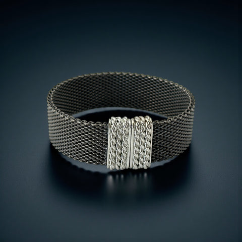 Signed Erica Zap bracelet in black nickel mesh with rhodium-plated magnetic clasp, 7-inch size, ¾-inch width, contemporary sculptural design, excellent condition.