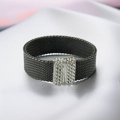 Signed Erica Zap bracelet in black nickel mesh with rhodium-plated magnetic clasp, 7-inch size, ¾-inch width, contemporary sculptural design, excellent condition.