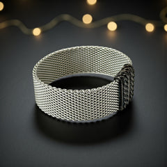 Erica Zap rhodium-plated mesh bracelet in black nickel finish with sculptural silhouette and magnetic clasp, likely new old stock.