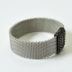 Erica Zap rhodium-plated mesh bracelet in black nickel finish with sculptural silhouette and magnetic clasp, likely new old stock.