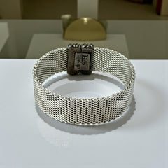 Erica Zap rhodium-plated mesh bracelet in black nickel finish with sculptural silhouette and magnetic clasp, likely new old stock.