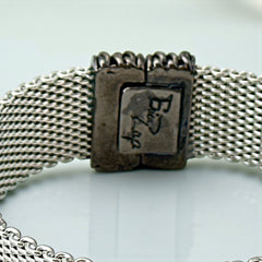 Erica Zap rhodium-plated mesh bracelet in black nickel finish with sculptural silhouette and magnetic clasp, likely new old stock.