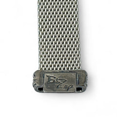 Erica Zap rhodium-plated mesh bracelet in black nickel finish with sculptural silhouette and magnetic clasp, likely new old stock.