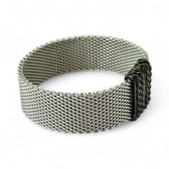 Erica Zap rhodium-plated mesh bracelet in black nickel finish with sculptural silhouette and magnetic clasp, likely new old stock.
