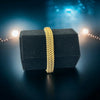 Vintage French gold-plated curb mesh bracelet from the 1960s/70s, featuring three soldered curb chains with a textured mesh design, a safety catch clasp with a safety chain, and intriguing marks (5M and an unclear jeweler's signature). Measures 8 inches long and showcases light vintage wear.