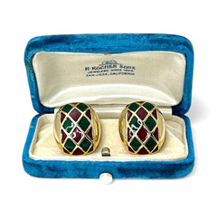 Pair of vintage French clip-on earrings with a rectangular gold-tone base, featuring a crisscross diamond lattice design filled with alternating deep red and forest green enamel; approx. 1" x ¾", late 1970s–1980s style, in very good condition with secure clips and rich color contrast.