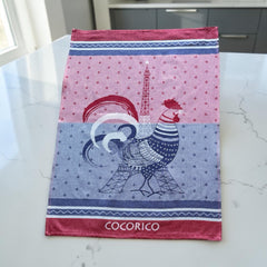 French jacquard cotton tea towel in blue, white, and red with rooster and Eiffel Tower motif and “Cocorico” lettering