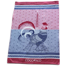 French jacquard cotton tea towel in blue, white, and red with rooster and Eiffel Tower motif and “Cocorico” lettering