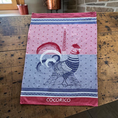 French jacquard cotton tea towel in blue, white, and red with rooster and Eiffel Tower motif and “Cocorico” lettering