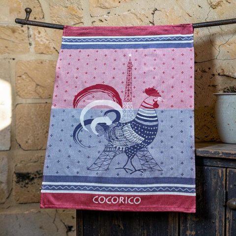 French jacquard cotton tea towel in blue, white, and red with rooster and Eiffel Tower motif and “Cocorico” lettering