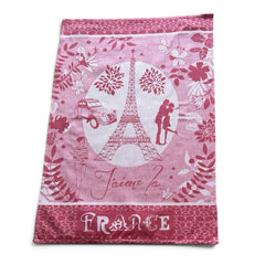 French jacquard cotton tea towel in red and white featuring the Eiffel Tower, romantic Paris couple, vintage car, and floral motifs with “J’aime la France” lettering.