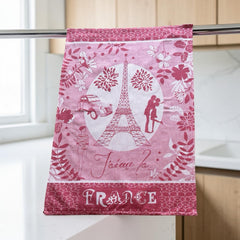 French jacquard cotton tea towel in red and white featuring the Eiffel Tower, romantic Paris couple, vintage car, and floral motifs with “J’aime la France” lettering.