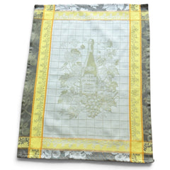 French jacquard cotton tea towel in green, yellow, and soft gray featuring a Le Vieux Chêne wine bottle surrounded by grapes and vine leaves.