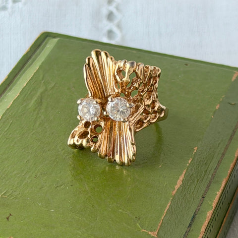 Vintage GCI Blanca gold‑tone ring with clear CZ stones and sculptural Brutalist organic design, shown from multiple angles.