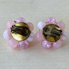 Vintage Germany light pink bead cluster clip‑on earrings with pearlized, crackled, and translucent beads in gold‑tone settings, signed Germany on the back.
