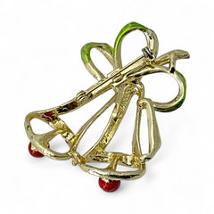 Vintage Gerry’s Christmas bells brooch in gold tone metal with red and green enamel ribbon, signed on back, festive mid-century holiday jewelry.