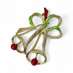 Vintage Gerry’s Christmas bells brooch in gold tone metal with red and green enamel ribbon, signed on back, festive mid-century holiday jewelry.