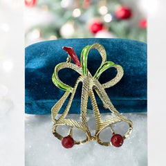 Vintage Gerry’s Christmas bells brooch in gold tone metal with red and green enamel ribbon, signed on back, festive mid-century holiday jewelry.