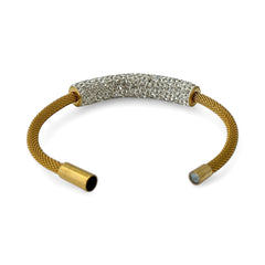 Gold tone mesh bracelet with a curved white centerpiece set with clear rhinestones over silver foil backing, creating a bright silvery shimmer; finished with a magnetic clasp and sleek modern design.