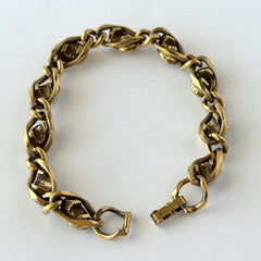 Vintage Goldette N.Y. bracelet with alternating green cabochons and faux pearls in textured gold‑tone curb links, fold‑over clasp signed Goldette N.Y.