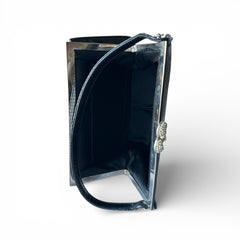 Vintage black Harry Rosenfeld handbag made of mixed exotic skins with a textured body, curved exotic-skin handle, and pavé rhinestone fruit clasp, shown from various angles including the satin-lined interior with signature label.