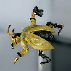 Signed Hattie Carnegie vintage bug brooch with yellow enamel coat, black top hat, turquoise cabochons, and gold-tone details—whimsical mid-century costume jewelry