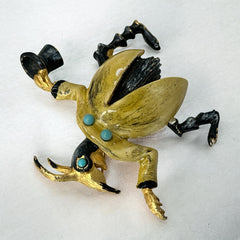 Signed Hattie Carnegie vintage bug brooch with yellow enamel coat, black top hat, turquoise cabochons, and gold-tone details—whimsical mid-century costume jewelry