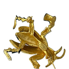 Signed Hattie Carnegie vintage bug brooch with yellow enamel coat, black top hat, turquoise cabochons, and gold-tone details—whimsical mid-century costume jewelry