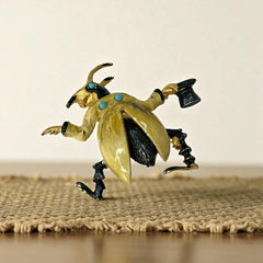 Signed Hattie Carnegie vintage bug brooch with yellow enamel coat, black top hat, turquoise cabochons, and gold-tone details—whimsical mid-century costume jewelry