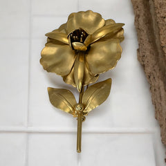 Vintage 1965 Hobé goldtone large flower brooch with dimensional petals, textured leaves, and a hidden locket compartment.