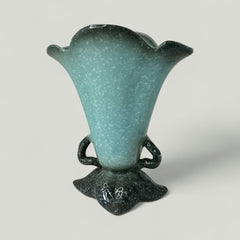 Vintage Hull Pottery vase with scalloped rim, aqua and speckled green glaze, double handles, and flared silhouette, photographed to highlight its mid-century design and glossy ceramic finish.