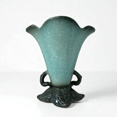 Vintage Hull Pottery vase with scalloped rim, aqua and speckled green glaze, double handles, and flared silhouette, photographed to highlight its mid-century design and glossy ceramic finish.