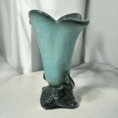 Vintage Hull Pottery vase with scalloped rim, aqua and speckled green glaze, double handles, and flared silhouette, photographed to highlight its mid-century design and glossy ceramic finish.