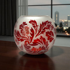 Vintage Illuminations frosted glass candle holder with etched red Spanish lace leaf pattern, rose bowl shape, softly glowing surface ideal for holiday decor or cozy ambiance.