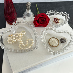 Vintage Imperial clear glass Candlewick heart-shaped dishes in a set of three, shown in various arrangements for decorative or serving use.