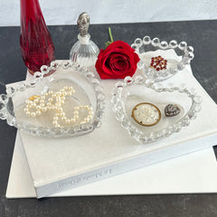 Vintage Imperial clear glass Candlewick heart-shaped dishes in a set of three, shown in various arrangements for decorative or serving use.